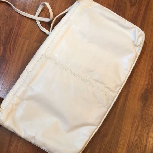 Vintage White and gold leather clutch purse with straps. - Picture 7 of 11